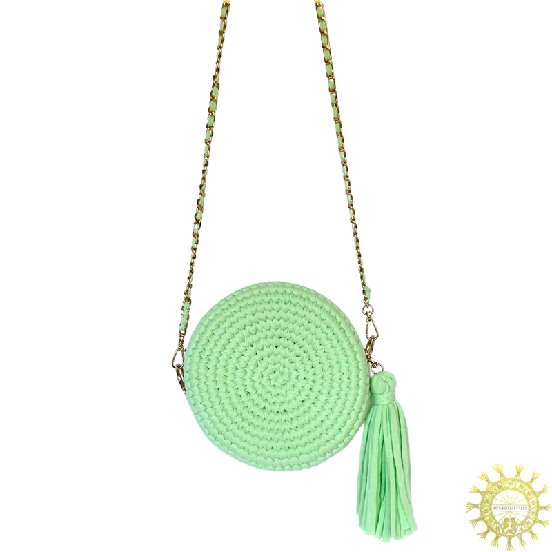 Woven Cord circlet Bag with tassels and long gold metal link shoulder strap with interwoven cord in Spearmint