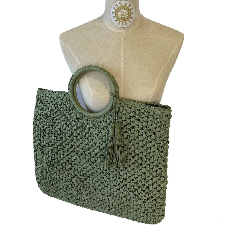 Raffia bag with tassels and ring handles in Olive Grove
