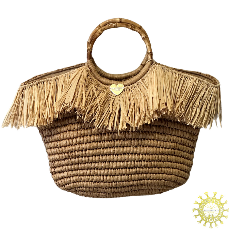 Raffia Bag with straw fringing trim around top of bag and double Bamboo handles